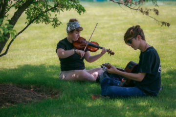 Guests Playing Music in the Park